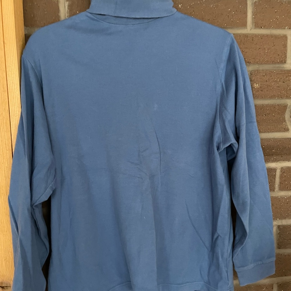 Long sleeved blue turtle neck in a L size by Eddie Bauer